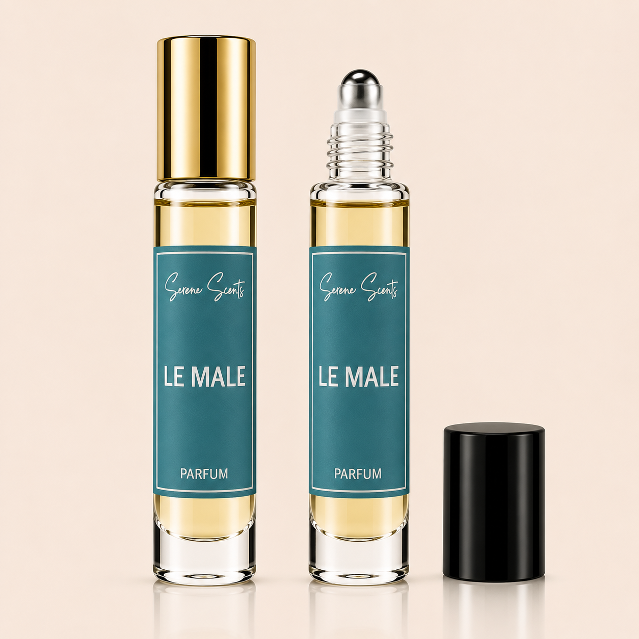 Two glass rollerball perfume bottles labeled 'Guerlain Le Male Parfum' are shown on a light beige background, one with a gold cap and one with a silver cap, plus a separate black cap standing beside them.