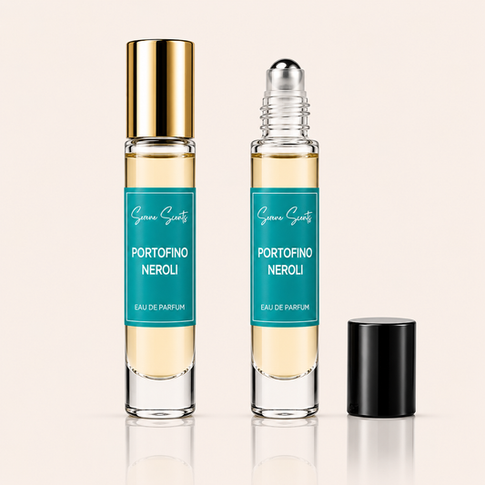 Two glass rollerball perfume bottles labeled 'Giulia Scrovegni Portofino Neroli Eau de Parfum' on a light beige background, with one bottle capped in gold and the other uncapped showing a black cap beside it.