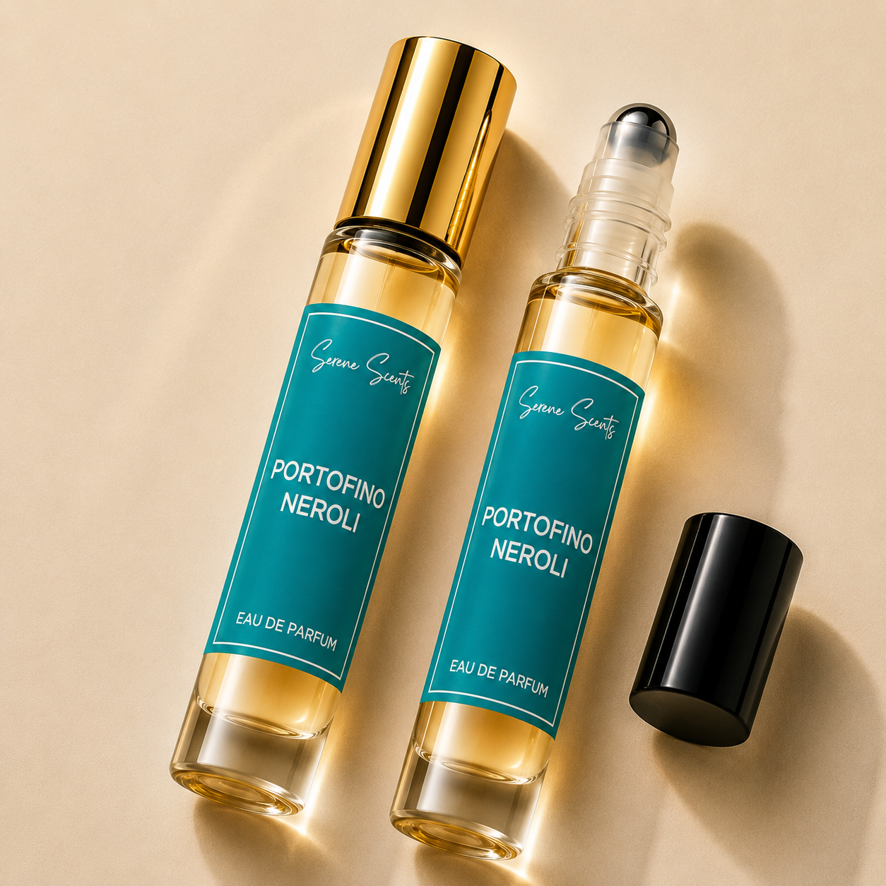 Two glass rollerball perfume bottles with teal labels reading 'Symma Scents Portofino Neroli Eau de Parfum' on a warm beige background. One bottle has a shiny gold cap and the other is open, showing the rollerball mechanism, with a detached black cap placed beside them.
