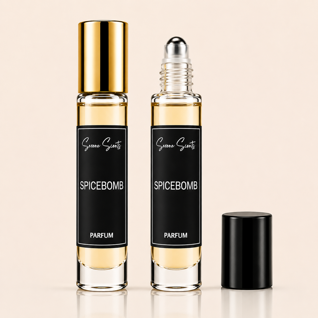 Two clear glass rollerball perfume bottles with black labels reading 'Scenic Scents SPICEBOMB PARFUM' are shown on a light beige background, one with a gold cap and one with a black cap removed beside it.